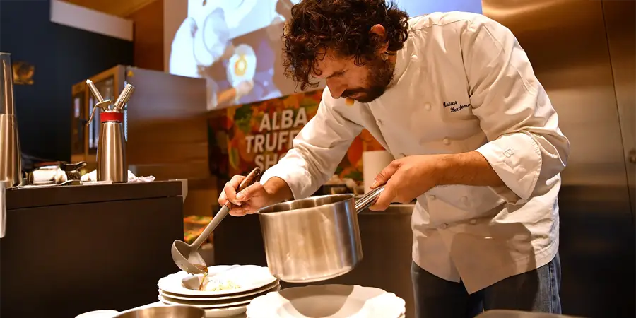 Chef assembling a dish